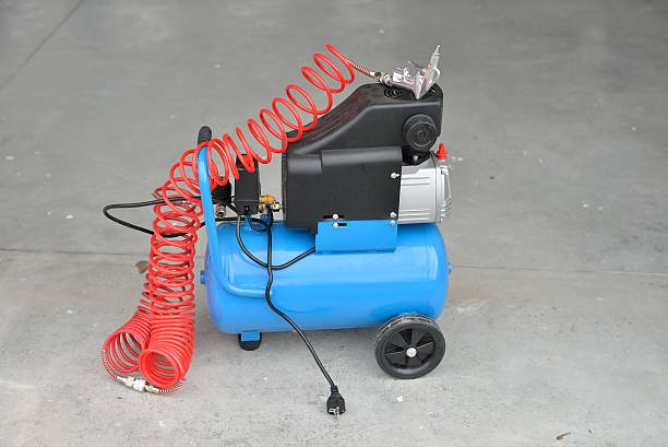 blue pump compressor for washing cars, indoor. cleaning concept.