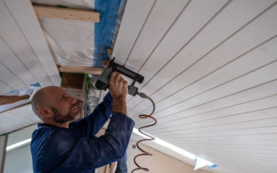 using nailing gun for roof panels home renovation