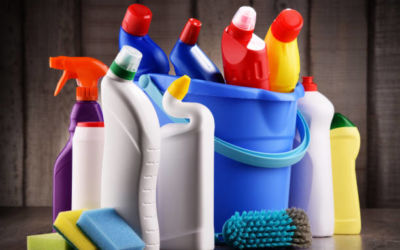 variety of detergent bottles and chemical cleaning supplies